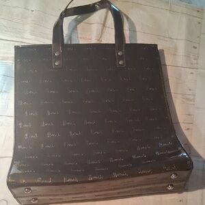Glossy Black Tote Bag with Subtle Logo Pattern